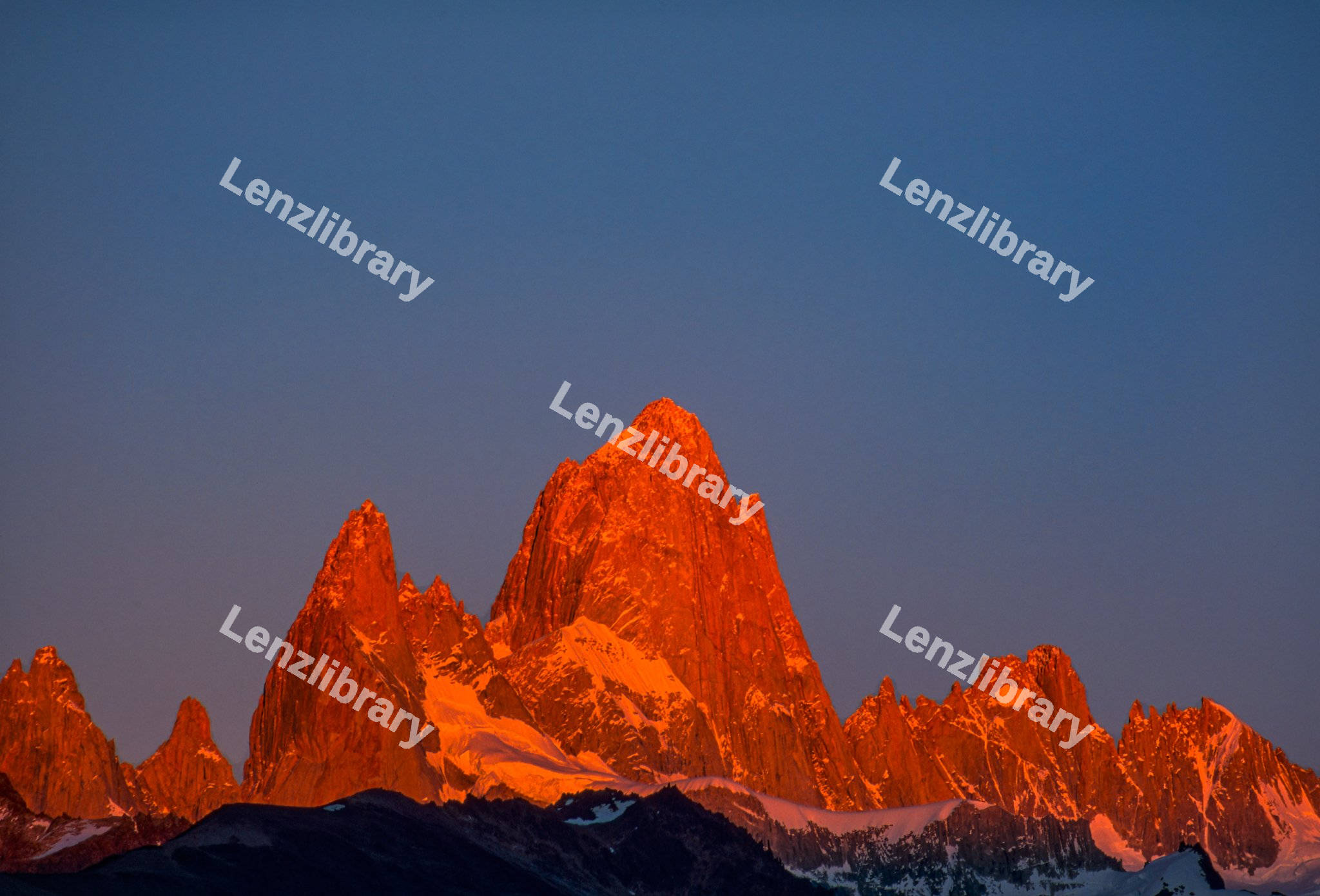 Orange mountains with blue sky